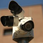 High-resolution surveillance cameras installed in a city environment for security purposes.