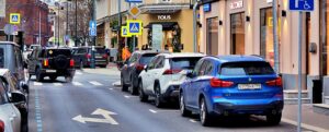 Street with parked cars and buildings in moscow