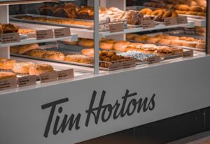 a display case filled with lots of donuts